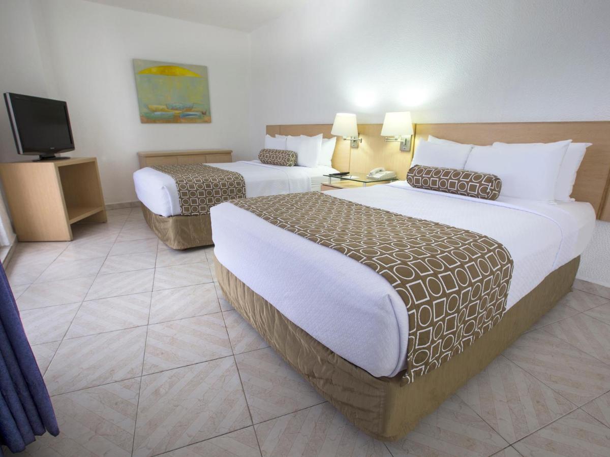 Hs Hotsson Hotel Acapulco Luaran gambar A typical room at the hotel